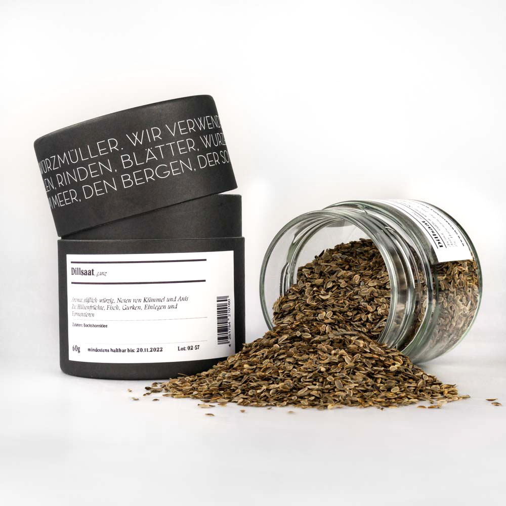 Dillsaat, ganz – offenes Gewürzglas mit Gewürzdose daneben
