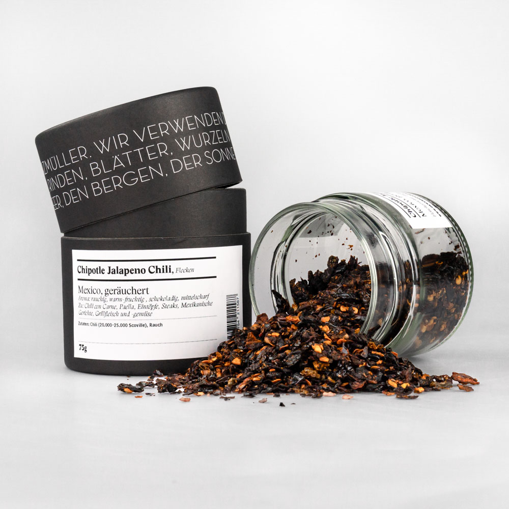 Chipotle Jalapeno Chili, Flocken – offenes Gewürzglas mit Gewürzdose daneben